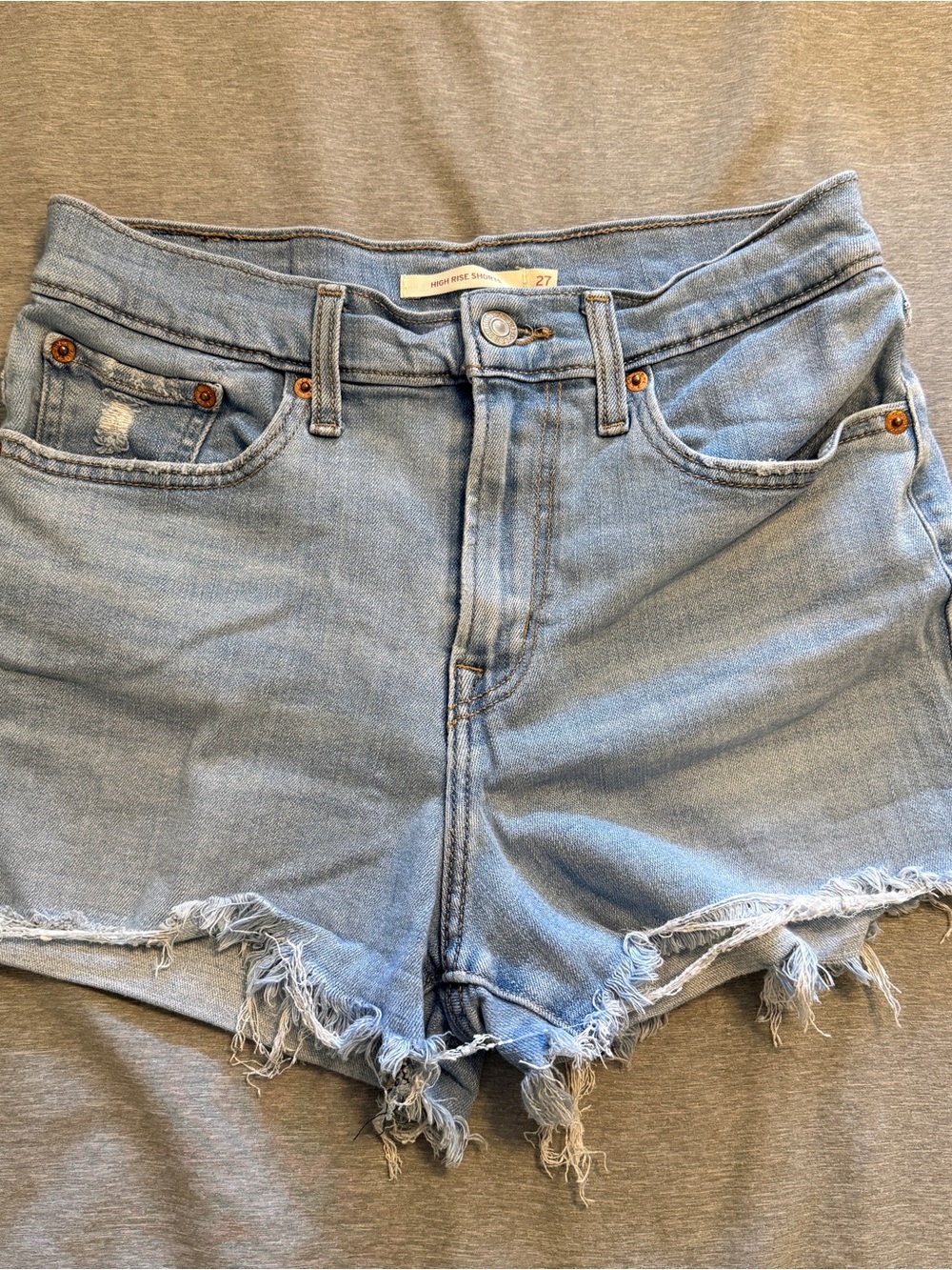 Levi's Light Wash Frayed Hem Denim Shorts